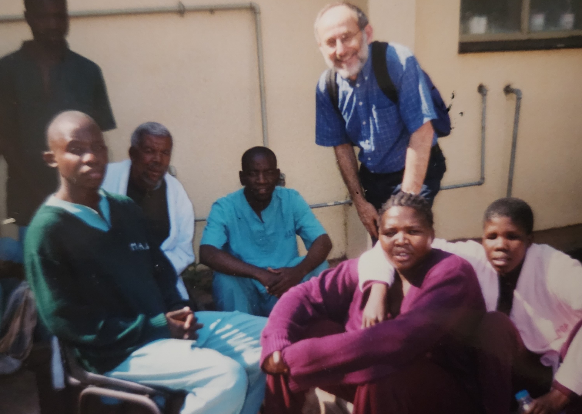 Sidney with hospital staff and patients in Botswana